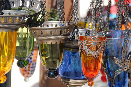 Colorful tea lamps hanging outside a shop in antalya photo